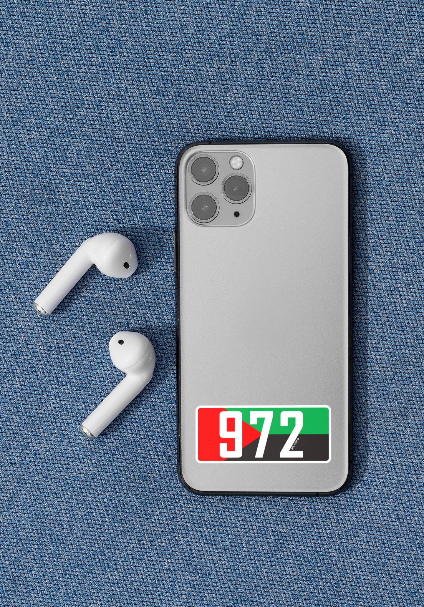 Autocollant code postal "972" avec drapeau régional, produit en papier de la marque Prodigi, appliqué sur un iPhone 11 Pro.
