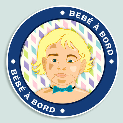 Autocollant "Bébé à bord" Prodigi avec texte "Adrien" en bleu, illustration de bébé, pour voiture ou surface plane.