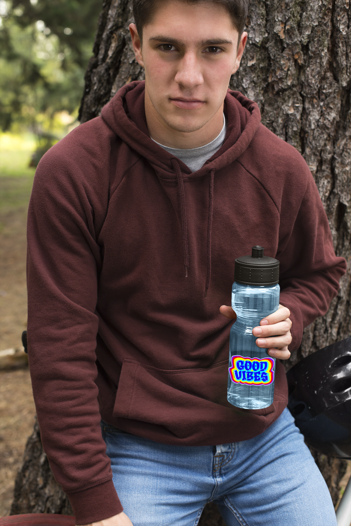 Autocollant "Good Vibes" de Prodigi, design coloré, montrant un homme tenant une bouteille d'eau, style moderne et inspirant.