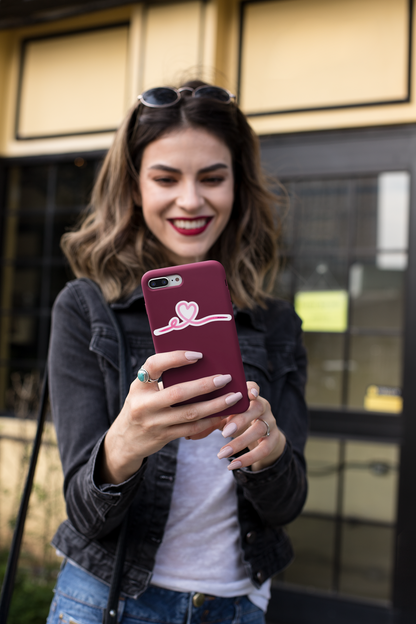 Autocollant Coeur tracé Rose de Prodigi sur une coque de téléphone, illustration tendance et élégante.