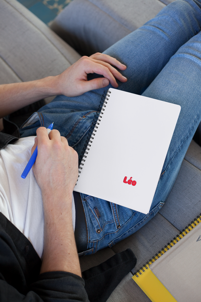 Autocollant personnalisé avec prénom unique, présenté sur un carnet d'école, conçu par Prodigi, pour décorer ou personnaliser.